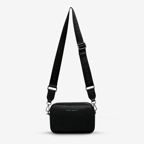 Status anxiety deals bags